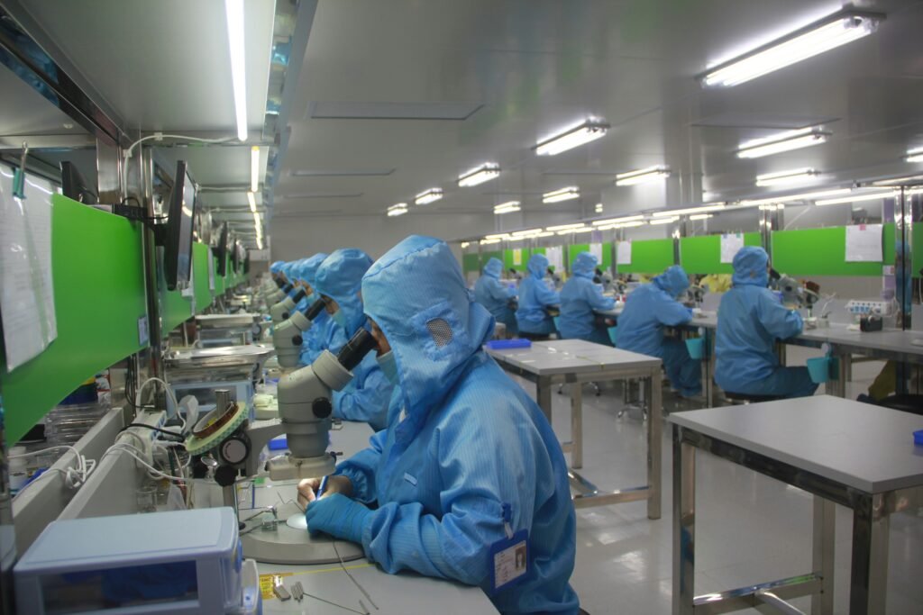 Industrial manufacturing floor with conveyor and processing equipment