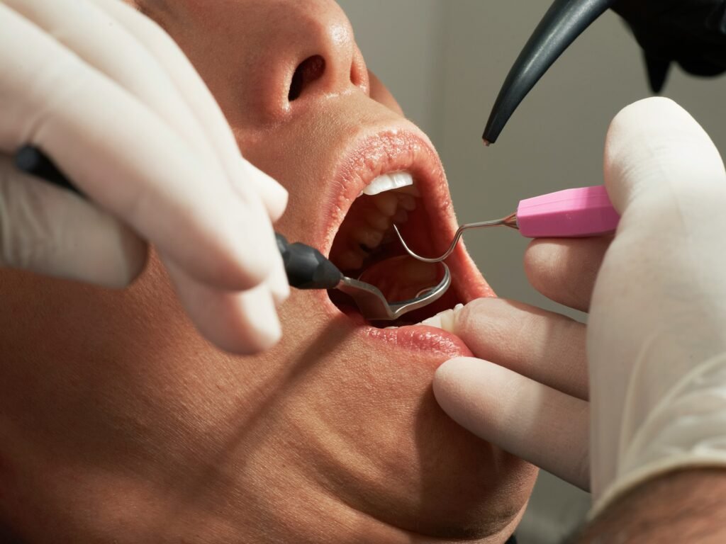 Person recovering after tooth extraction while eating soft foods, illustrating safe post-extraction healing, dental recovery, and gradual return to solid food.
