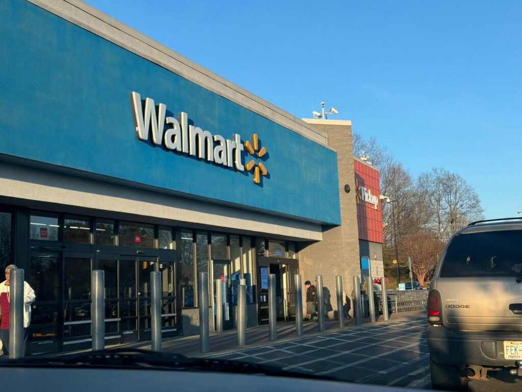 Customer using Walmart receipt lookup tool on a smartphone with digital receipts, shopping cart, and return icons