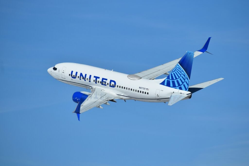 United Airlines Polaris Business Class cabin with lie-flat seats, premium dining service, modern interiors, and luxury travel amenities.