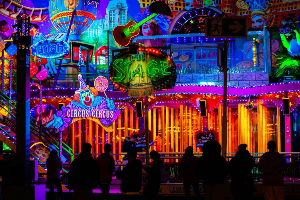 The Amazing Digital Circus characters including Pomni, Jax, Caine, Ragatha, Zooble, Gangle, and Kinger in the surreal digital circus world.