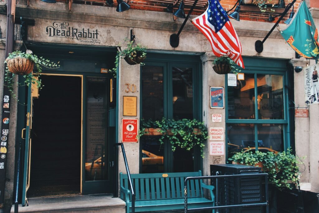 Small business owners in 2026 using AI technology, digital commerce tools, and innovative strategies to adapt to economic changes.