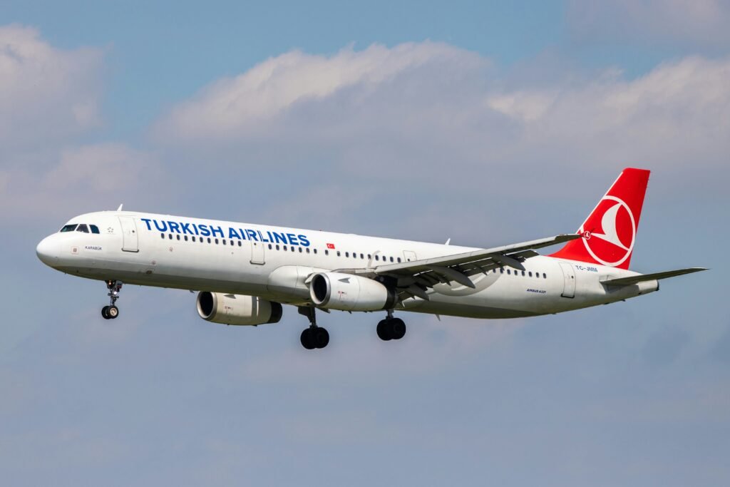 Turkish Airlines business class cabin with lie-flat seats and premium onboard dining.